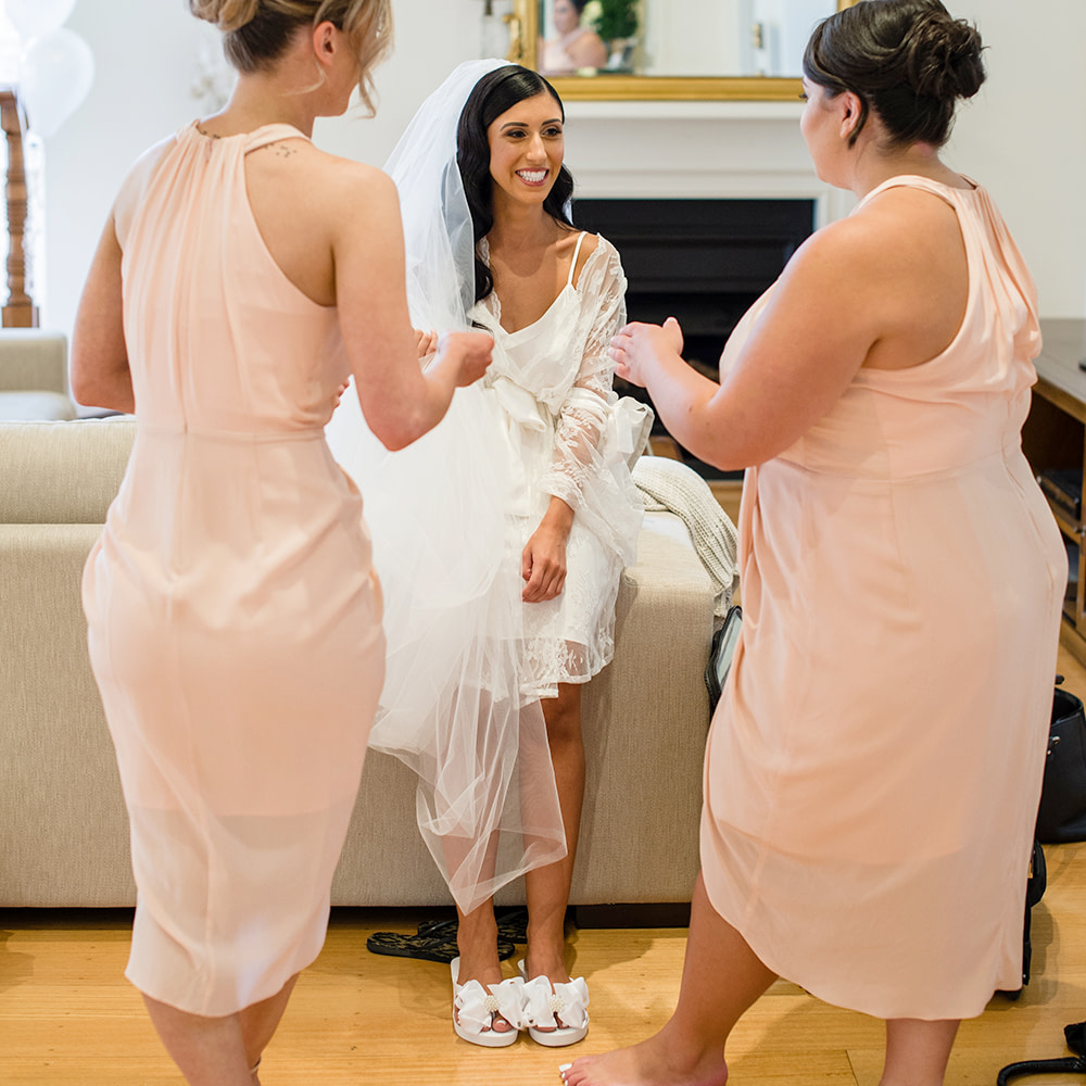 Bride wearing her Bridal Flip Flops for Wedding