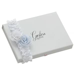 White satin garter with blue and white roses