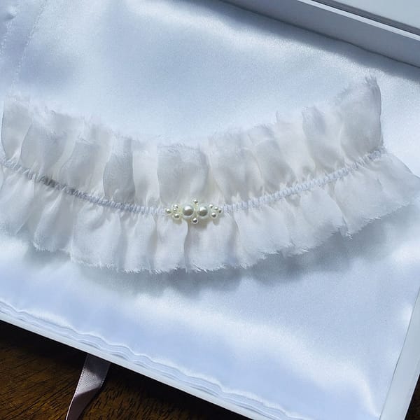 Ornate Swarovski Pearls on a pure silk Bridal Garter