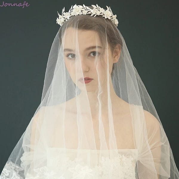 Bride wearing Porcelain Flower and Leaf Wedding Crown
